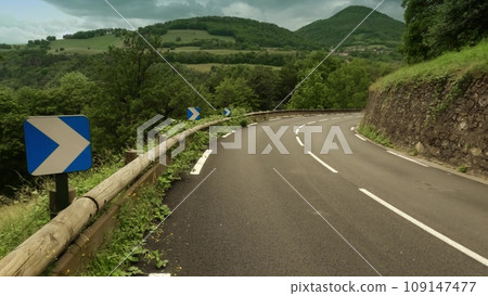 POV walk shot of a beautiful car road close to Saint Martin d'Uriage in French Alps, France 109147477