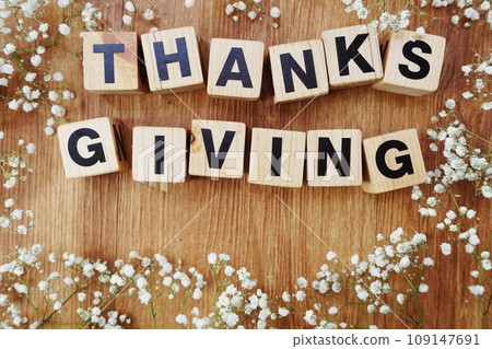 thanksgiving alphabet letters and space copy on wooden background thanksgiving alphabet letters and space copy on wooden background 109147691
