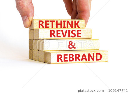 Rethink revise rebrand symbol. Concept word Rethink Revise and Rebrand on beautiful block. Beautiful white background. Business brand motivational rethink revise rebrand concept. Copy space. 109147741