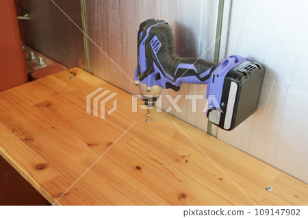 Secure the wooden board to the reinforcing bars with drill screws.Shelf Secure the wooden board to the reinforcing bars with drill screws.Shelf 109147902