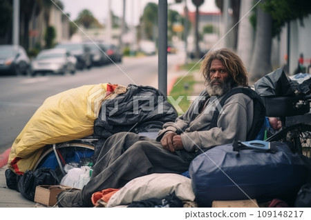 Homeless people on the streets of a sunny city 109148217