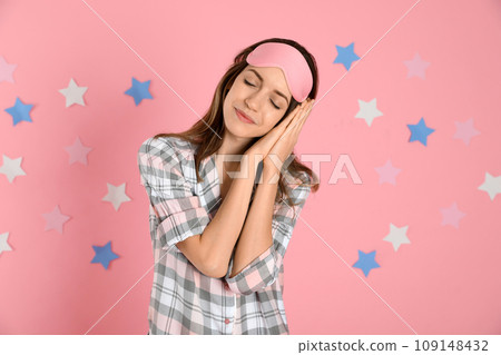 Woman with flower showing smooth skin after bikini epilation on pink background, closeup 109148432
