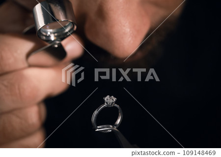 Professional jeweler working with ring, closeup view Professional jeweler working with ring, closeup view 109148469