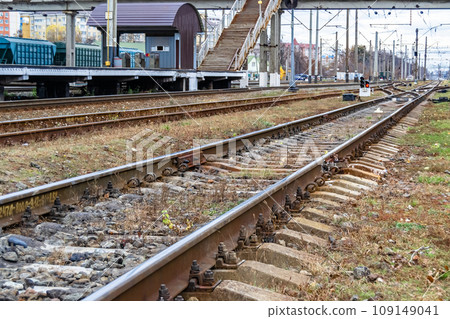 Photography to theme railway track after passing train on railroad Photography to theme railway track after passing train on railroad 109149041