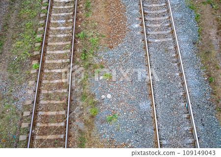 Photography to theme railway track after passing train on railroad Photography to theme railway track after passing train on railroad 109149043