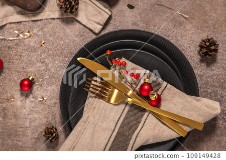 Christmas table with black plates 109149428