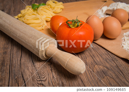 Raw pasta, tomato and eggs Raw pasta, tomato and eggs 109149685