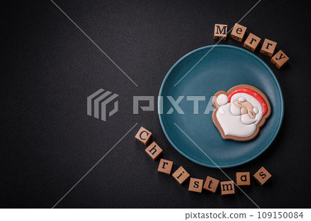 Beautiful Christmas composition with copy space with an inscription in wooden cubes Beautiful Christmas composition with copy space with an inscription in wooden cubes 109150084