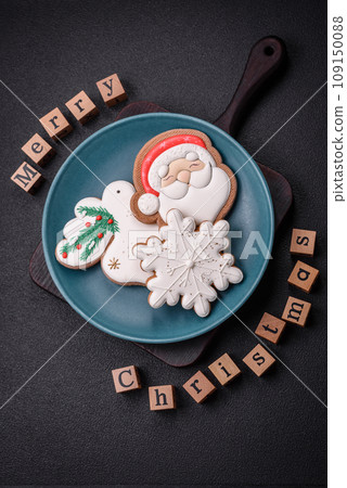 Beautiful Christmas composition with copy space with an inscription in wooden cubes 109150088