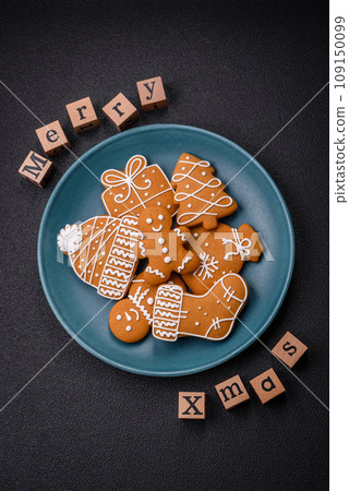 Beautiful Christmas composition with copy space with an inscription in wooden cubes 109150099