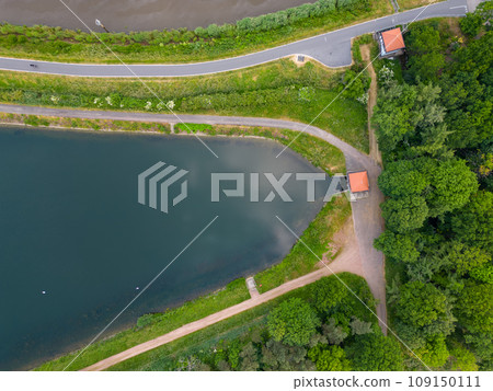Aerial Serenity: Pathways and Pond 109150111