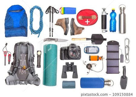 Set of tourist trekking items on white background. Top view of accessories for travel. Set of tourist trekking items on white background. Top view of accessories for travel. 109150884