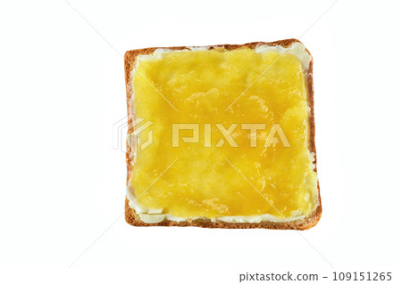 Toast with lemon jam and butter isolated on white background, top view. Toast with lemon jam and butter isolated on white background, top view. 109151265