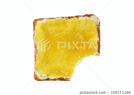 Take a bite toasted bread with lemon jam, isolated on a white. Top view . Bitten toast with lemon jam on white background. Take a bite toasted bread with lemon jam, isolated on a white. Top view . Bitten toast with lemon jam on white background. 109151266