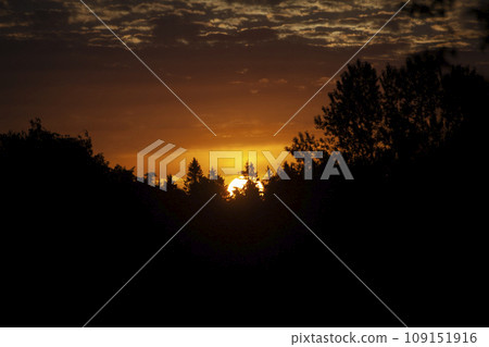 Sunset. Dawn in morning. Warm light in sky. Heavenly landscape in village. Sunset. Dawn in morning. Warm light in sky. Heavenly landscape in village. 109151916