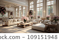 Interior of classical living room in luxurious villa. Comfortable cushioned furniture, coffee table, lots of flower bouquets in vases, gorgeous chandelier, large windows with picturesque view. 109151948