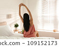 Young woman awakening at home. Lazy morning 109152173