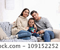 Happy family with little son spending time together at home. Winter vacation 109152252