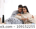 Happy couple spending time together at home. Winter vacation 109152255