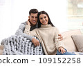 Happy couple spending time together at home. Winter vacation 109152258