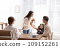 Professional psychologist working with family in office 109152261