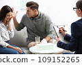 Professional psychologist working with couple in office 109152265