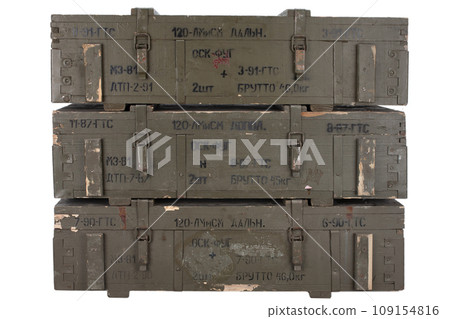 Soviet army ammunition stack of green crates. Text in russian - type of ammunition, projectile caliber, projectile type, number of pieces and weight. Soviet army ammunition stack of green crates. Text in russian - type of ammunition, projectile caliber, projectile type, number of pieces and weight. 109154816