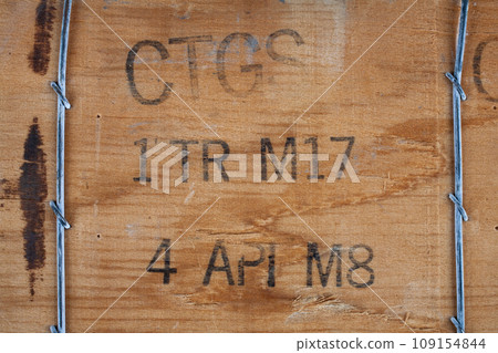 wood texture background from army ammunition wooden crate with type ammunitions wood texture background from army ammunition wooden crate with type ammunitions 109154844