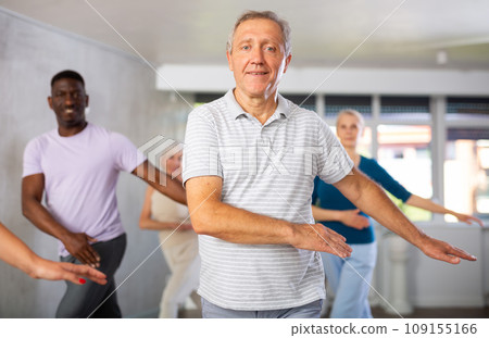 Group of multiethnic mature people dancing classical dance 109155166