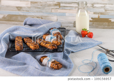 Cereal bars with peanuts and chocolate 109156957