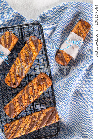 Cereal bars with peanuts and chocolate 109157064
