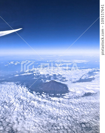 Mt. Fuji in November seen from above a passenger plane Mt. Fuji in November seen from above a passenger plane 109157641
