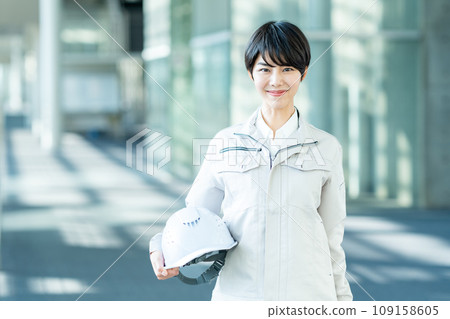 Woman dressed in work clothes Woman dressed in work clothes 109158605