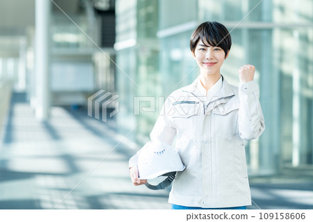 Woman dressed in work clothes Woman dressed in work clothes 109158606