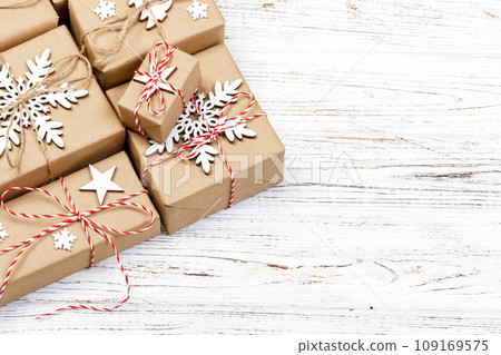 Gift boxes on light wooden background with copy space top view 109169575