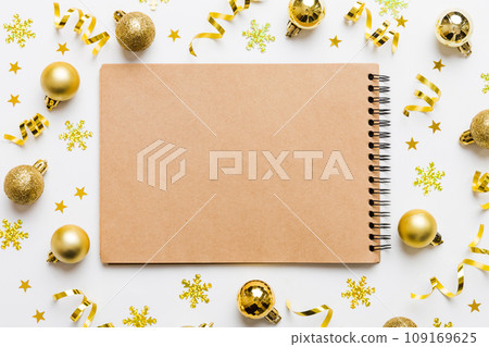 Christmas blank greeting card mock-up scene. Creative layout made of Christmas toy and paper card note. Flat lay. Nature New Year concept Christmas blank greeting card mock-up scene. Creative layout made of Christmas toy and paper card note. Flat lay. Nature New Year concept 109169625