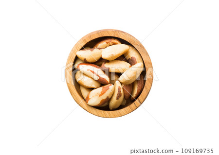 Roasted Brazil nut in bowl isolated on white background. Brazil nut is snack or raw of cook. Healthy food concept 109169735