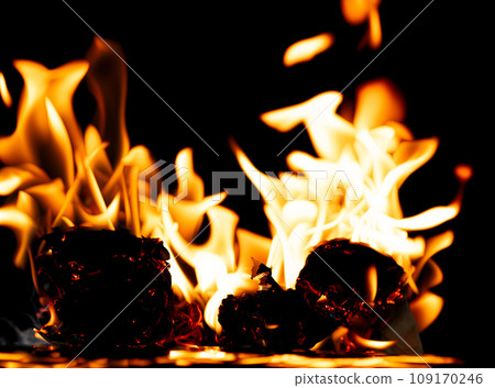 Fire Flames Blaze burn on black background isolated. Firing flaming on paper abstract texture. Fire burn on paper to ashes and create flame. Photo real high resolution Fire Flames Blaze burn on black background isolated. Firing flaming on paper abstract texture. Fire burn on paper to ashes and create flame. Photo real high resolution 109170246