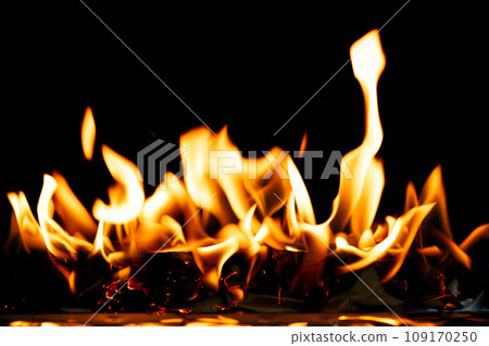 Fire Flames Blaze burn on black background isolated. Firing flaming on paper abstract texture. Fire burn on paper to ashes and create flame. Photo real high resolution Fire Flames Blaze burn on black background isolated. Firing flaming on paper abstract texture. Fire burn on paper to ashes and create flame. Photo real high resolution 109170250