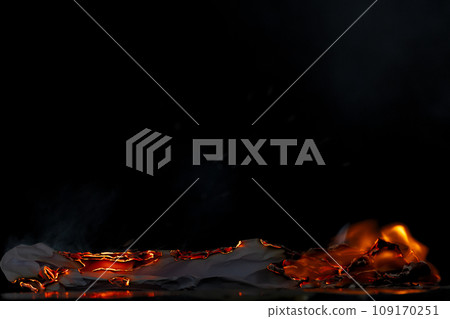 Fire Flames Blaze burn on black background isolated. Firing flaming on paper abstract texture. Fire burn on paper to ashes and create flame. Photo real high resolution Fire Flames Blaze burn on black background isolated. Firing flaming on paper abstract texture. Fire burn on paper to ashes and create flame. Photo real high resolution 109170251