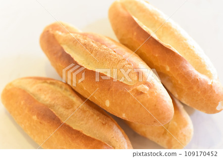 Vietnamese traditional Banh Mi baguette on white background Vietnamese traditional Banh Mi baguette on white background 109170452