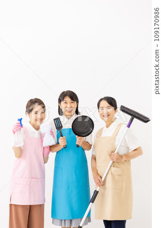 Woman in apron housekeeping Woman in apron housekeeping 109170986