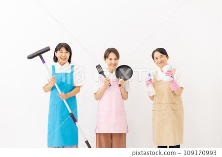 Woman in apron housekeeping Woman in apron housekeeping 109170993