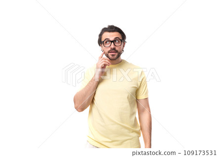 young stylish european man with stubble wears glasses for vision correction young stylish european man with stubble wears glasses for vision correction 109173531
