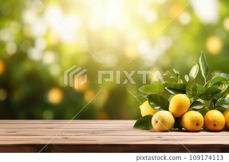 Wooden table top on blurred background orchard with lemons Wooden table top on blurred background orchard with lemons 109174113