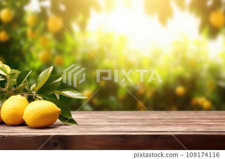 Wooden table top on blurred background orchard with lemons Wooden table top on blurred background orchard with lemons 109174116