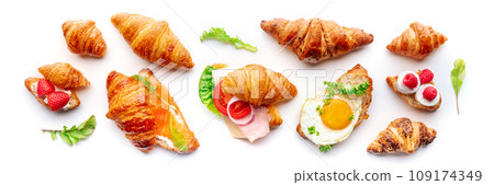 Croissant sandwich variety panorama. Different stuffed croissants, overhead 109174349