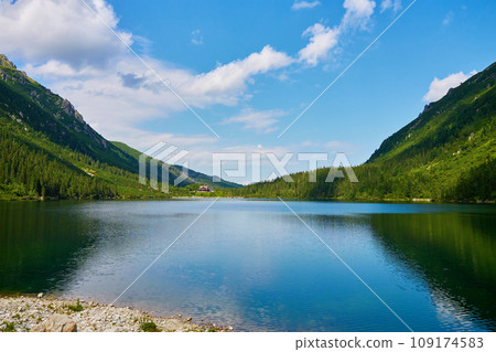 Mountains range near lake at summer day 109174583