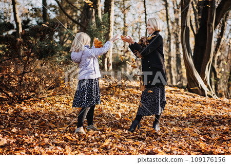 Relationship between mother and teenage daughter. Teens Health and Wellness Guiding teen through physical changes during adolescence. Happy Mother and teen girl daughter outdoor 109176156