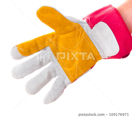 gloved hand with hacksaw gloved hand with hacksaw 109176971